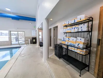 a room with a pool and shelves of towels at Decatur 1805 by SummitCove Lodging in Keystone
