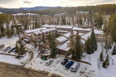 an aerial view of a building in the snow at Walk to Main St! Ultimate Winter Park Getaway in Winter Park