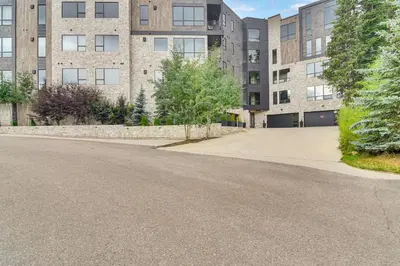 an empty street in front of a building at Ski-InandSki-Out! Winter Park Family Gem with Hot Tub in Winter Park