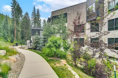 a path in front of a building at Ski-InandSki-Out! Winter Park Family Gem with Hot Tub in Winter Park