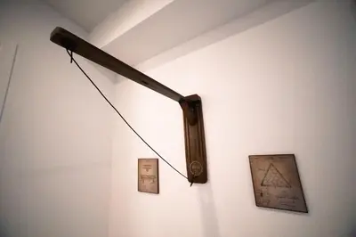 a wooden pole hanging on a wall with a picture at New TownHome Downtown Westminster 4-6 Guests in Westminster
