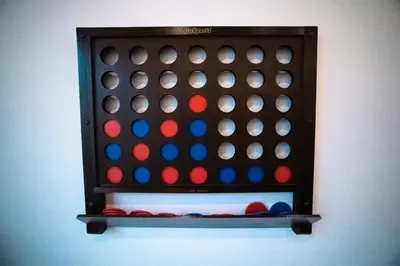 a board game withacus on a wall at New TownHome Downtown Westminster 4-6 Guests in Westminster