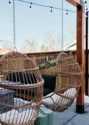 a couple of baskets hanging from a swing at Luxury 5BR - Hot Tub - Game Garage - Mini Golf in Denver