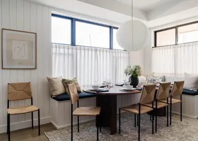 a dining room with a table and chairs at Luxury 5BR - Hot Tub - Game Garage - Mini Golf in Denver