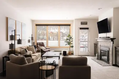 a living room with two couches and a fireplace at Lakefront Keystone Escape - Near Slopes & Trails in Keystone
