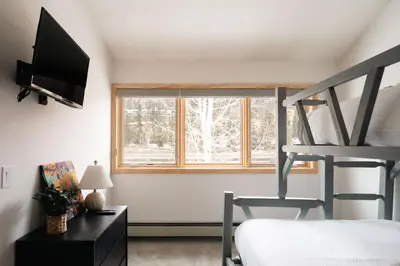 a bedroom with a bunk bed and a window at Lakefront Keystone Escape - Near Slopes & Trails in Keystone