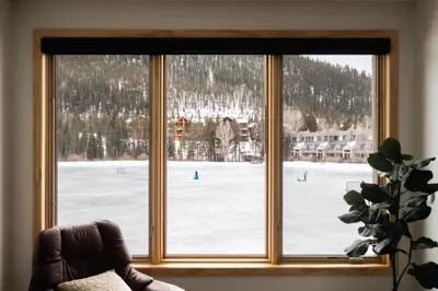a window with a view of a snow covered field at Lakefront Keystone Escape - Near Slopes & Trails in Keystone