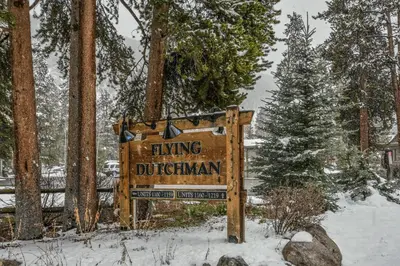 a sign for a hiking dothan in the snow at Flying Dutchman 1201 by SummitCove Lodging in Keystone