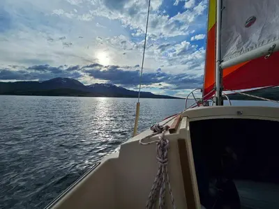 a boat on a large body of water at Hygge Haus - 2BD Lake View & Pet Friendly Retreat in Dillon