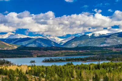 a view of a mountain range with snow covered mountains at Hygge Haus - 2BD Lake View & Pet Friendly Retreat in Dillon