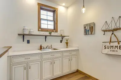a kitchen with a sink and a window at Ride-InandRide-Out Grand Lake Hub Near Lakes and RMNP in Grand Lake