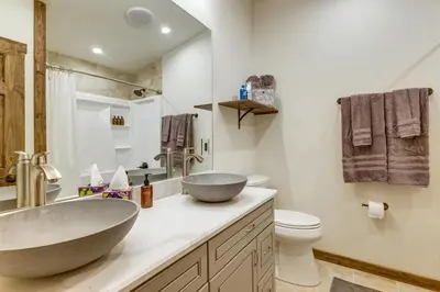 a bathroom with a large sink and a toilet at Ride-InandRide-Out Grand Lake Hub Near Lakes and RMNP in Grand Lake