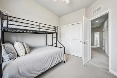 a bedroom with a bunk bed in a room at Cozy Mountain View Getaway! in Arvada
