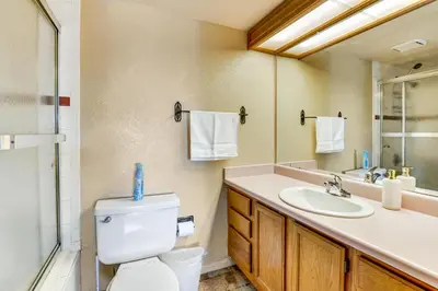 a bathroom with a toilet and a sink at Extended Stay in Denver Area! Pet-Friendly Retreat in Aurora
