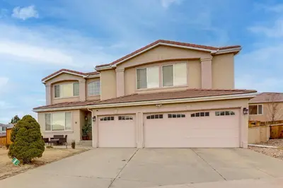 a large house with a garage at Extended Stay in Denver! Cozy Apartment with Patio in Denver