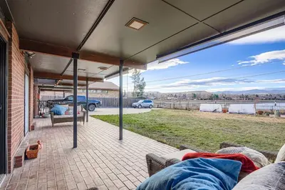 a screened in porch of a house with a view at FoxGardens Incredible Lake & Mtn View Private Secure in Lakewood