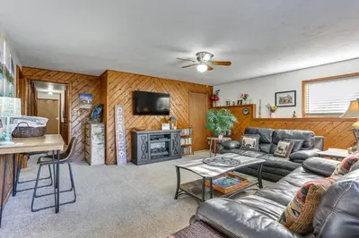 a living room with a couch and a tv at Pet-Friendly Pine Home Near Hiking and Fishing! in Pine