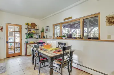 a kitchen with a table and chairs in it at Pet-Friendly Pine Home Near Hiking and Fishing! in Pine
