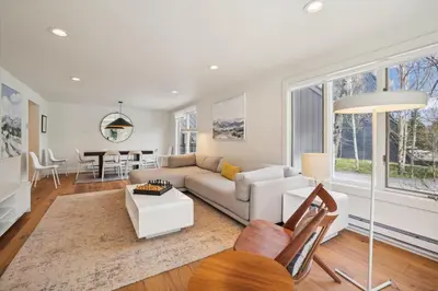 a living room with a couch and a table at Stay at Frisco Creekside Retreat! Located in a great location in Frisco