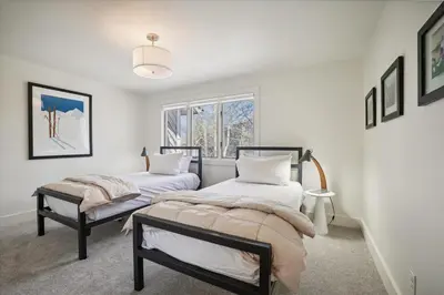 a bedroom with two beds and a window at Stay at Frisco Creekside Retreat! Located in a great location in Frisco