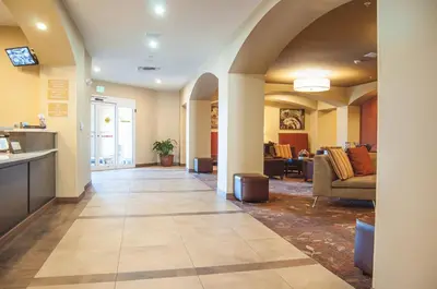 a lobby of a hospital with a waiting room at Candlewood Suites Fort Collins by IHG in Fort Collins