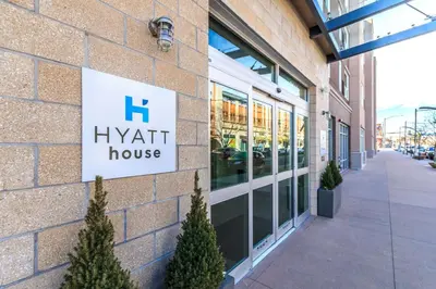 a hyrant house sign on the side of a building at Hyatt House Denver Lakewood Belmar in Lakewood