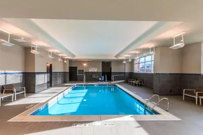 a large indoor pool in a hotel room at Hyatt House Denver Lakewood Belmar in Lakewood