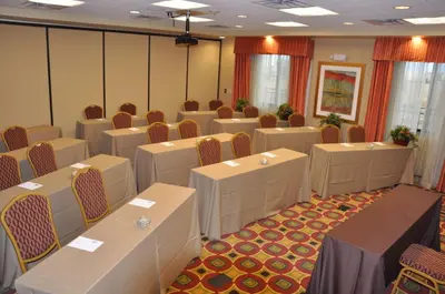 a conference room with white tables and chairs at Hampton Inn & Suites Denver/Highlands Ranch in Littleton