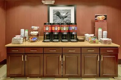 a counter with a bunch of drinks on it at Hampton Inn & Suites Denver/Highlands Ranch in Littleton