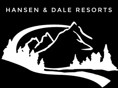 a black and white sticker of a bear and mountains at The Inn on Fall River & Fall River Cabins in Estes Park