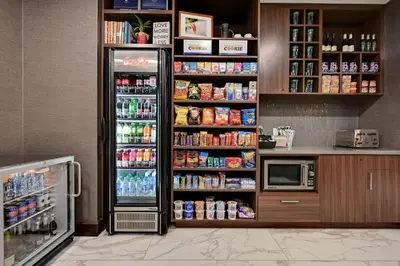 a refrigerator filled with lots of food and drinks at DoubleTree by Hilton Denver International Airport, CO in Denver