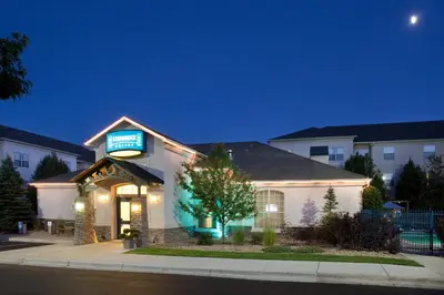 a hotel with a sign on the side of a building at Staybridge Suites Denver Tech Center by IHG in Centennial