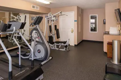 a fitness room with a treadmill and a gym at Staybridge Suites Denver Tech Center by IHG in Centennial