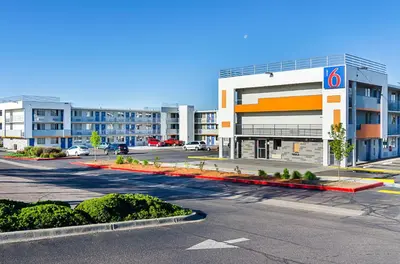 an empty parking lot in front of a building at Motel 6- Denver, CO Downtown in Denver