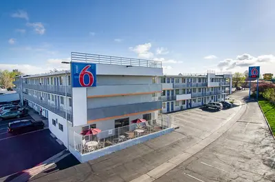 an overhead view of a hotel with a parking lot at Motel 6- Denver, CO Downtown in Denver