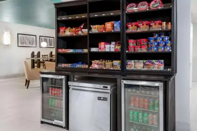 a store with two refrigerators in a store at Baymont by Wyndham Henderson-Northeast Denver in Henderson