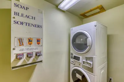 a washer and dryer in a room at Hidden River Lodge 5975 in Keystone