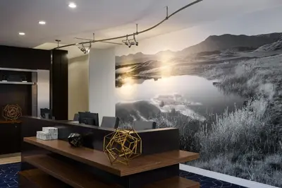 an office with a large painting on the wall at Courtyard by Marriott Denver Southwest/Littleton in Littleton