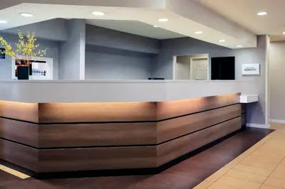 a lobby with a reception counter in a building at Residence Inn Denver North/Westminster in Westminster