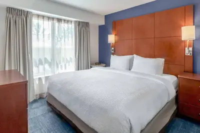 a hotel room with a large bed and a window at Residence Inn Denver North/Westminster in Westminster