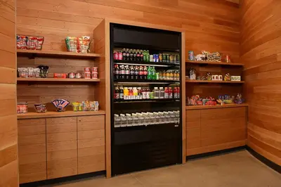 a room with a refrigerator with drinks in it at Hotel Indigo Denver Downtown - Union Station by IHG in Denver