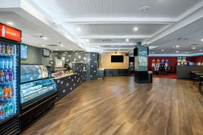a store interior with a hard wood floor and a counter at Grand Z Hotel Casino by Red Lion Hotels in Central City
