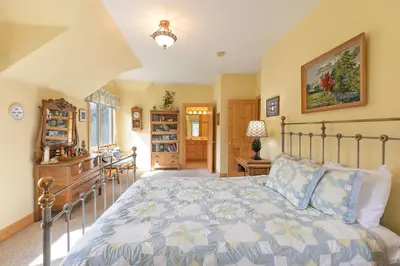 a bedroom with a bed in a room at Hohenmark Haus Home: Great Year-Round Location in Breckenridge