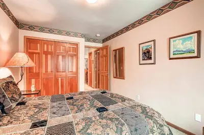 a bedroom with a large bed in a room at Village Townhome: Views, Location in Frisco