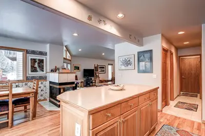 a kitchen with a large island in a room at Village Townhome: Views, Location in Frisco