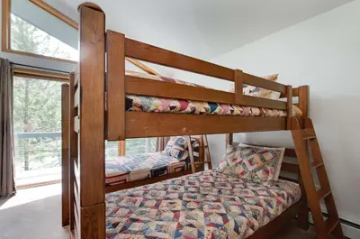 a bedroom with two bunk beds in a room at Stonebridge Townhome: Remodeled, Quiet Frisco Location in Frisco