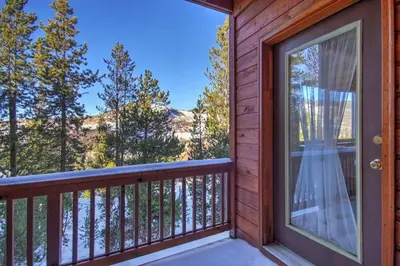 a balcony with a view of the mountains at 127 Lookout Ridge Townhouse in Dillon