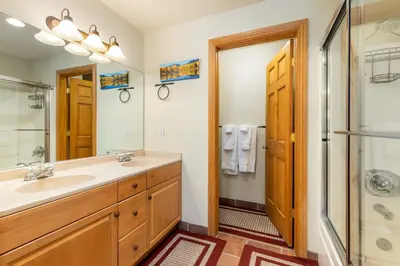 a bathroom with a sink and a shower at 5949 Hidden River Lodge Condo in Keystone