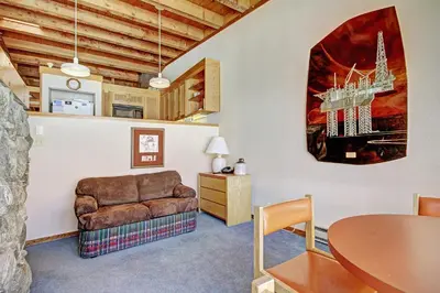a living room with a couch and a table at 2035 Homestead Condo in Keystone