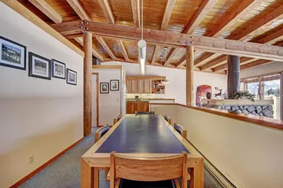 a large dining room with a ping pong table at 2035 Homestead Condo in Keystone